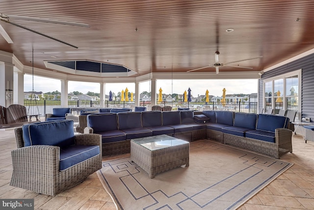 dock area featuring a deck with water view