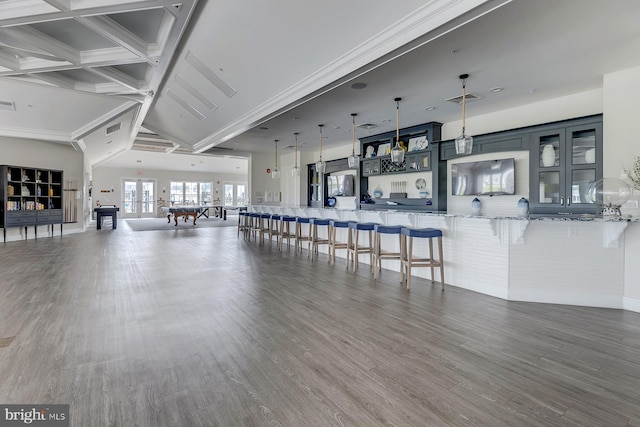 living room with coffered ceiling, beam ceiling, and hardwood / wood-style floors