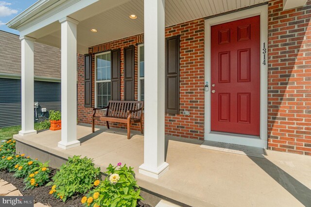 property entrance with a porch