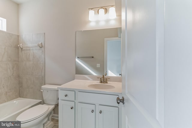 full bathroom with vanity, shower / tub combination, and toilet