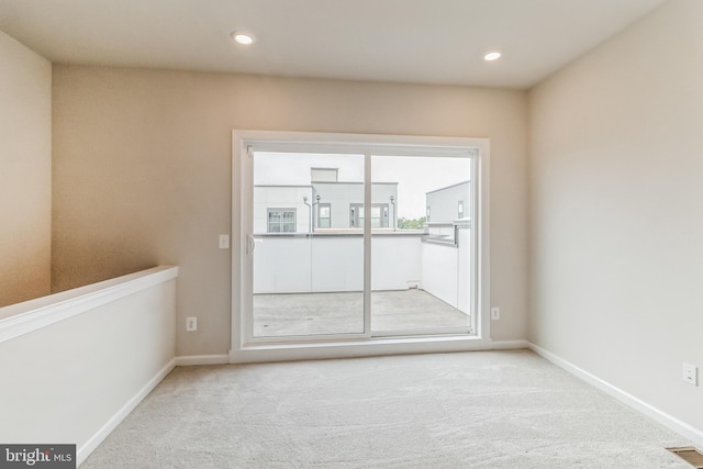 view of carpeted spare room