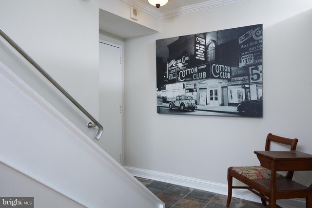 interior space with tile patterned flooring and crown molding