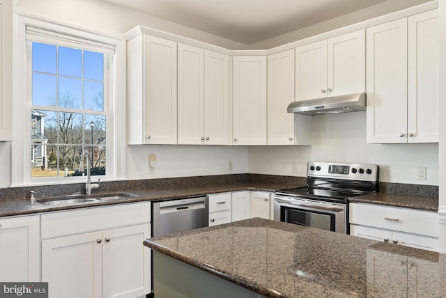 kitchen with white cabinets, stainless steel appliances, and sink