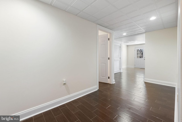 unfurnished room featuring dark hardwood / wood-style flooring