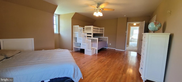 bedroom featuring light hardwood / wood-style flooring and ceiling fan