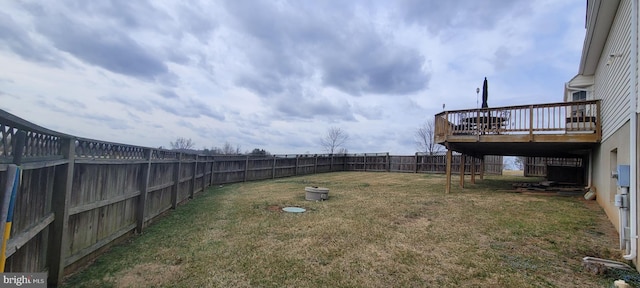 view of yard featuring a wooden deck