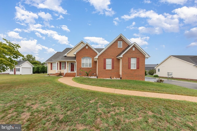 view of front of property with a garage and a front yard