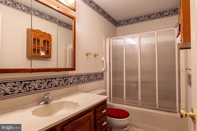 full bath with washtub / shower combination, vanity, and toilet