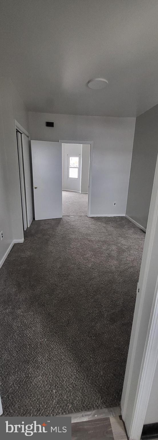 interior space featuring carpet