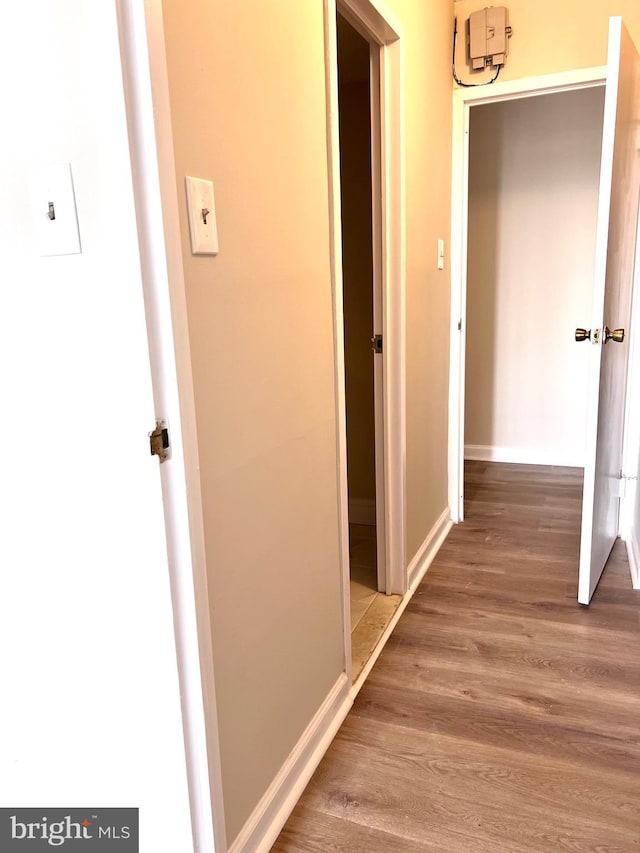 hallway featuring hardwood / wood-style floors