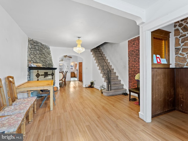 interior space featuring ceiling fan and light wood-type flooring