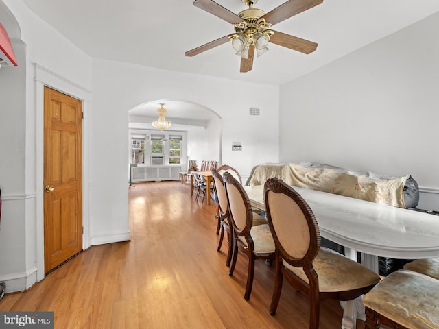 dining area featuring ceiling fan and light hardwood / wood-style floors