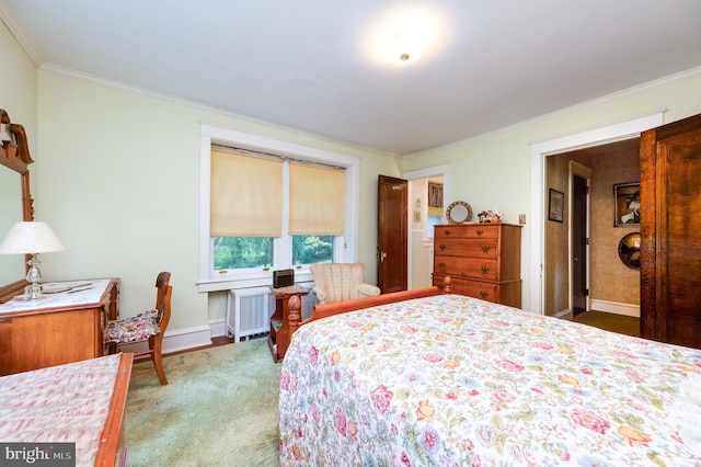 bedroom with crown molding, carpet flooring, and radiator heating unit