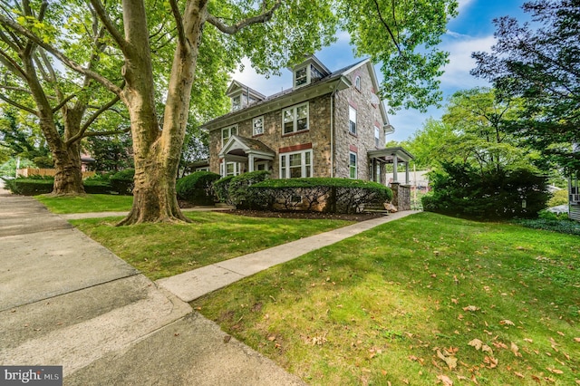 view of front of house with a front yard