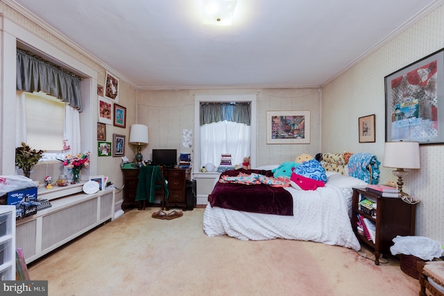 bedroom with ornamental molding, carpet floors, and radiator heating unit