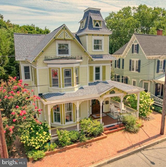 victorian home featuring covered porch