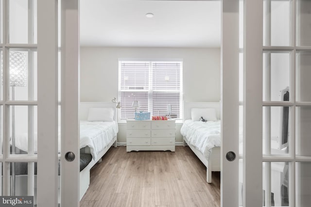 bedroom with light wood-type flooring