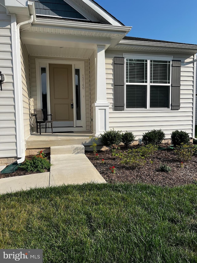 entrance to property with a porch