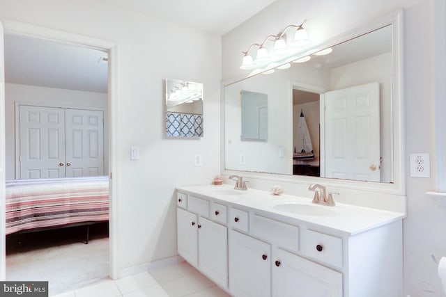 bathroom with vanity and tile patterned flooring