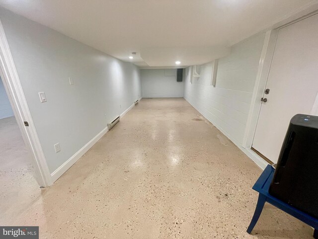 hallway featuring a baseboard heating unit