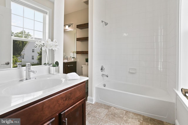 bathroom with vanity and shower / bathtub combination