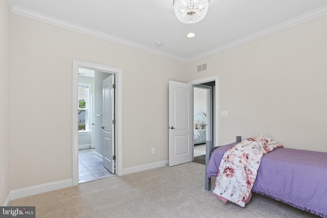 bedroom featuring light carpet, ornamental molding, visible vents, and baseboards