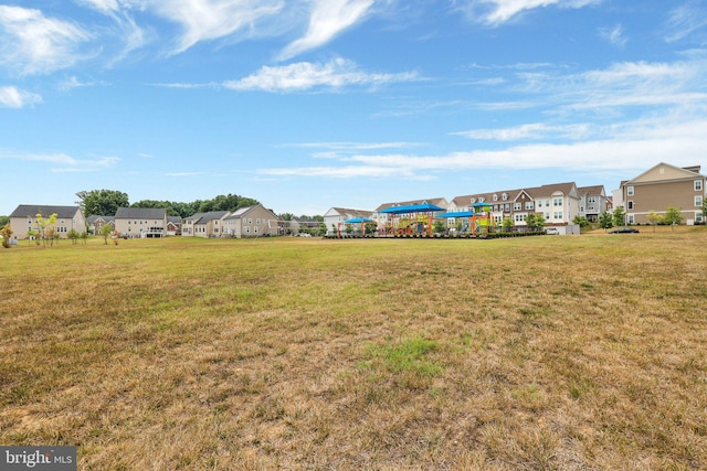 view of yard featuring a residential view