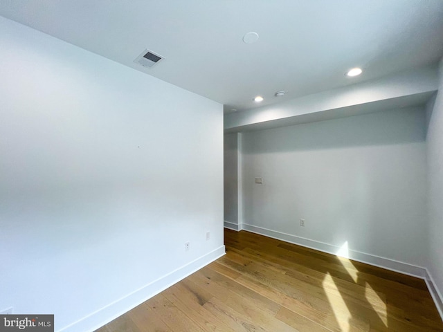 unfurnished room featuring light wood-type flooring