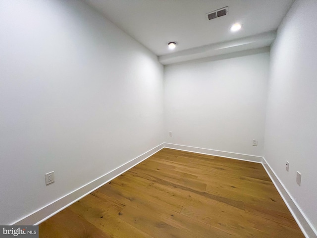 spare room featuring hardwood / wood-style floors