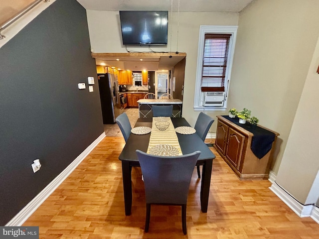 dining area featuring light hardwood / wood-style floors