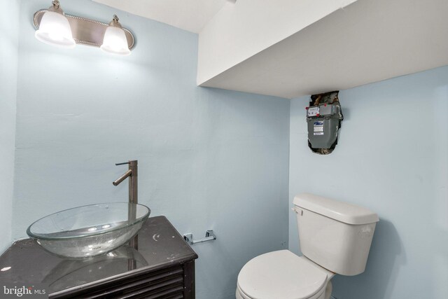 bathroom with sink and toilet