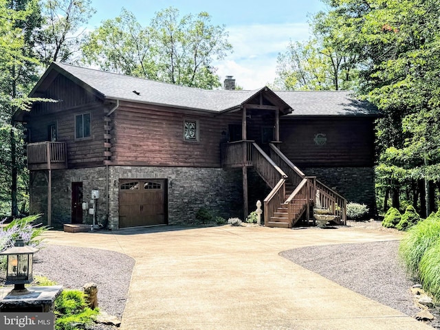 log cabin with a garage