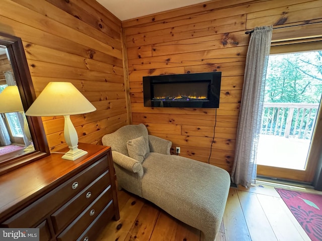 bedroom featuring multiple windows and light wood-type flooring