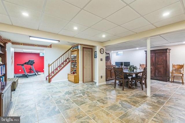 dining space featuring a paneled ceiling