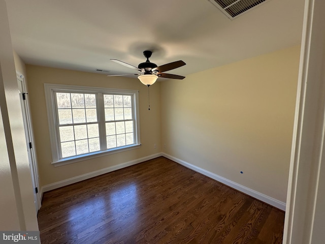 715 Parishville Rd, Gore, VA 22637 - spare room featuring dark wood-style flooring, visible vents, baseboards, and a ceiling fan