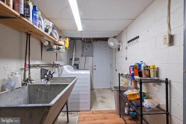 laundry room with independent washer and dryer and electric panel