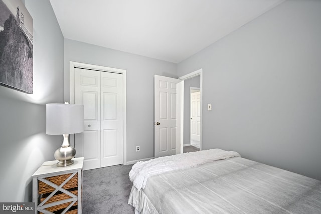 carpeted bedroom with a closet