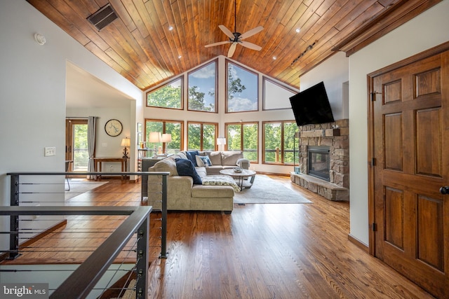 living room with wood ceiling and hardwood / wood-style floors