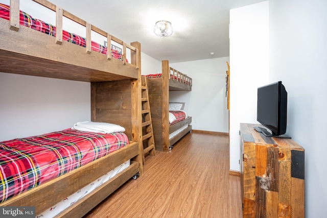 bedroom with light hardwood / wood-style flooring