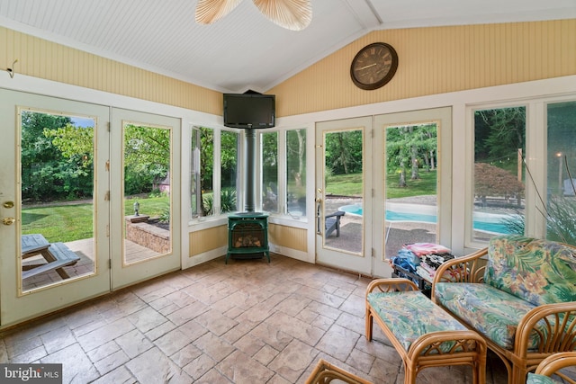 unfurnished sunroom featuring french doors and lofted ceiling