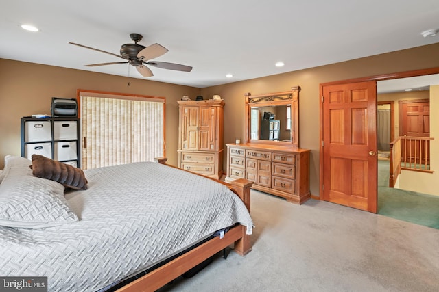 carpeted bedroom featuring ceiling fan