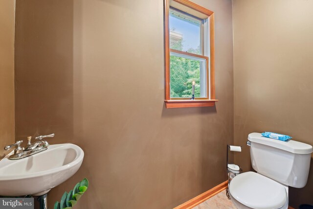 bathroom with sink and toilet