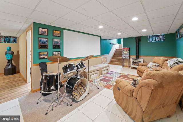 705 Franklinville Rd, Mullica Hill, NJ 08062 - living area with a paneled ceiling, stairway, a wood stove, and recessed lighting