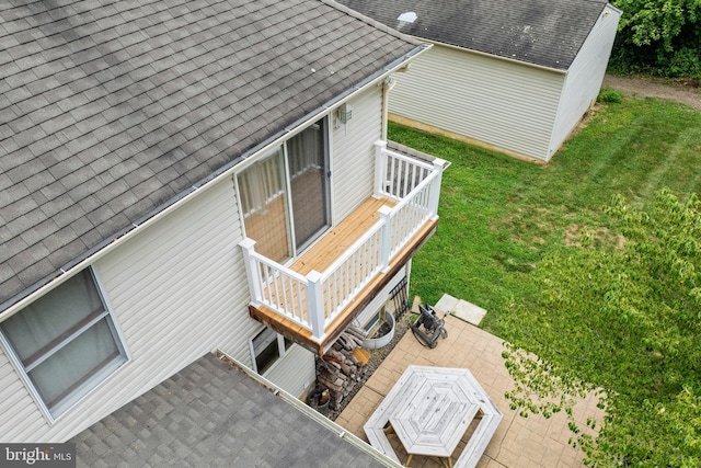 705 Franklinville Rd, Mullica Hill, NJ 08062 - exterior space featuring roof with shingles, a patio area, and a lawn