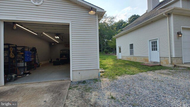 view of yard featuring a patio and a shed