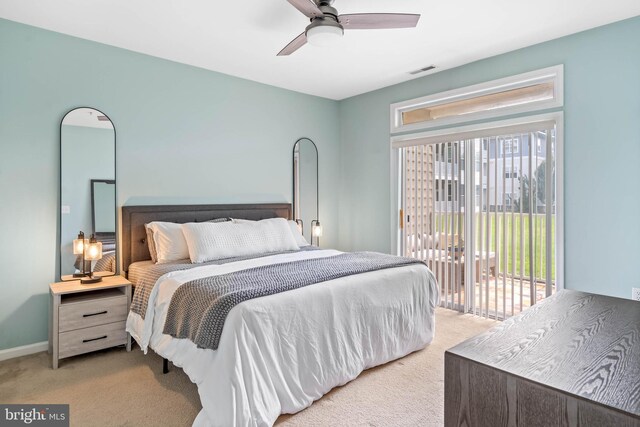 bedroom with light carpet, access to outside, and ceiling fan