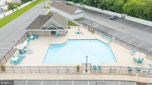 view of swimming pool with a patio