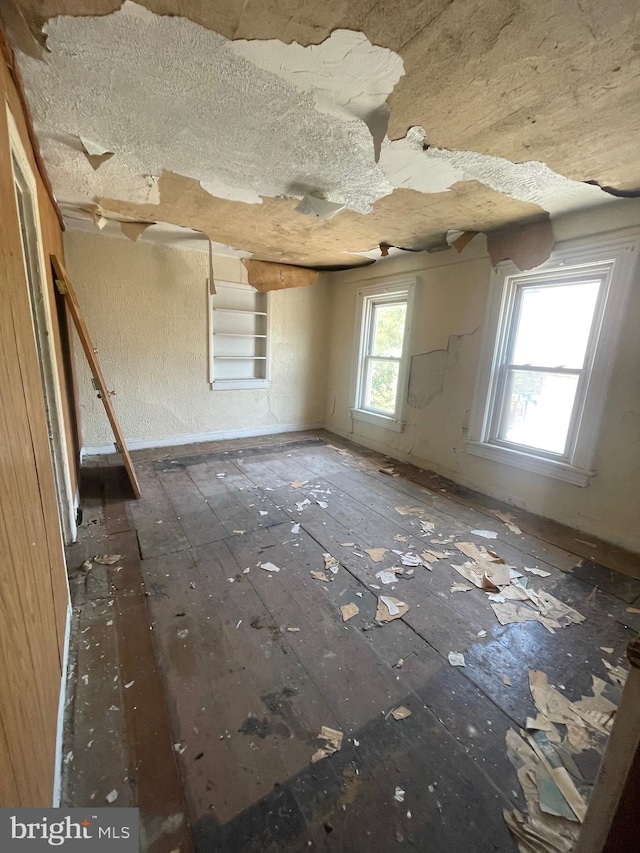 empty room featuring a textured ceiling