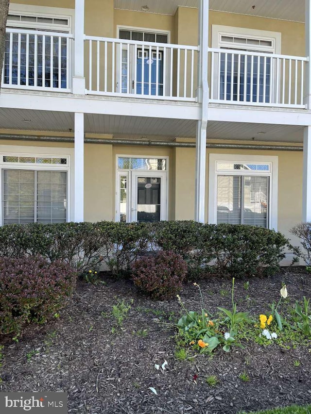 view of property exterior with a balcony