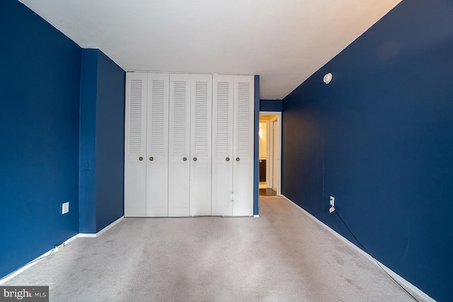 unfurnished bedroom with a closet